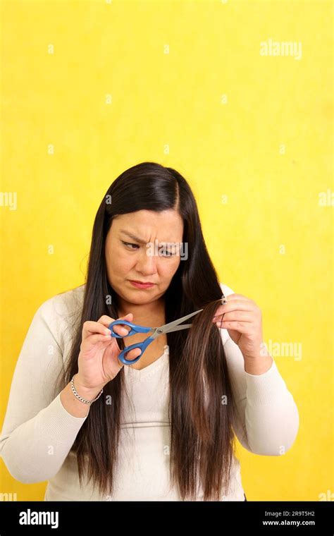 Year Old Latina Woman With Very Long Straight Hair Wants To Cut Her Hair With Scissors Stock