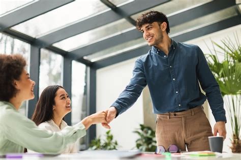 Premium Photo Multiracial Business People Shaking Hands During Job