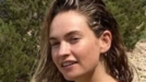 Lily James Flaunts Her Incredible Figure In A Black Bikini Before Abseiling Down A Cliff As She