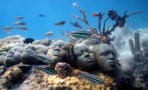 Sculpturs Of African Slaves That Fell Pushed Into The Sea Quite