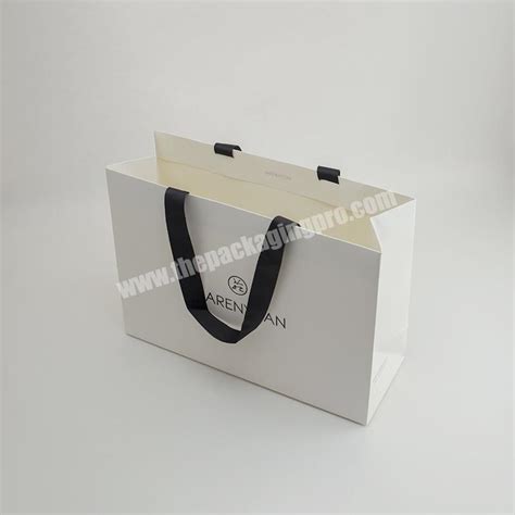 Fashion Luxury Hot Gold Stamping UV Coating Bag Paper Custom Simple Elegant Clothes Packaging