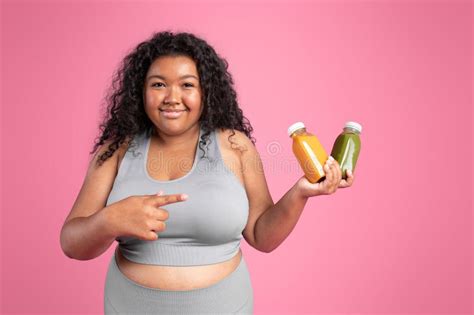 Positive African American Body Positive Lady In Sportswear Holding And