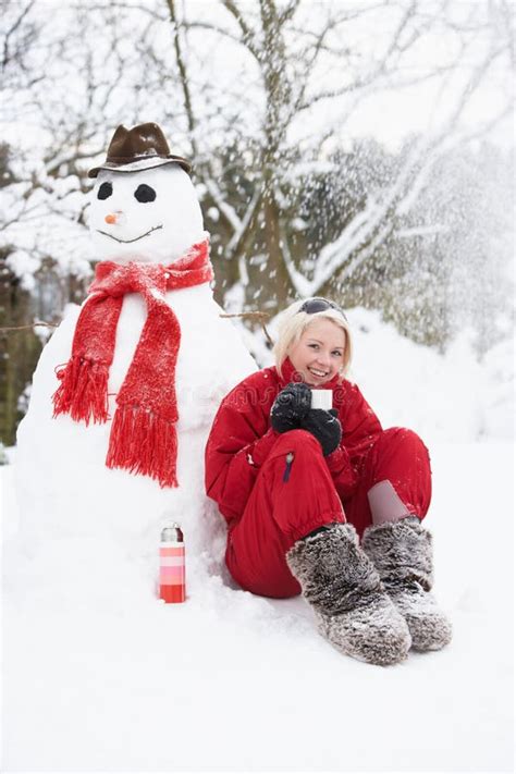 Girl Next To Snowman With Hot Drink Stock Photo Image Of Laughing Scene