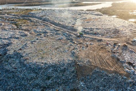 Premium Photo | Garbage dump aerial view of waste pile in trash dump ...