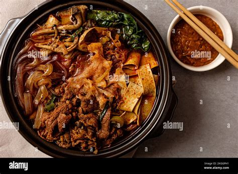 Spicy Hot Pot With Meat Vegetables And Noodles Stock Photo Alamy