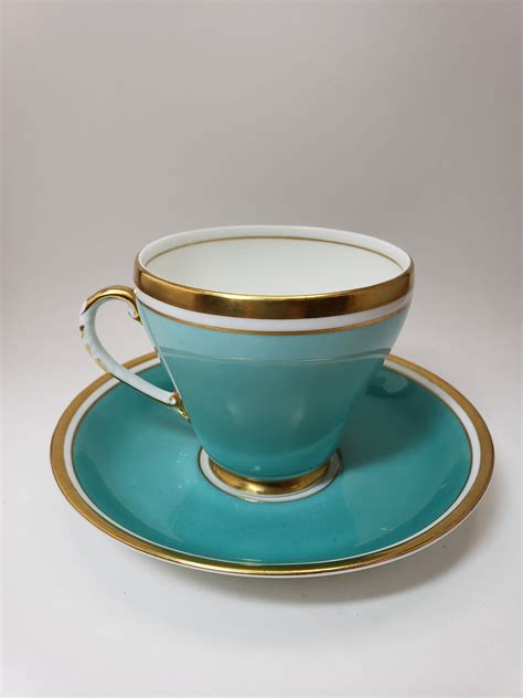 Royal Grafton Bone China Turquoise Footed Tea Cup And Saucer Set