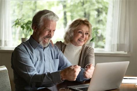 Overjoyed Mature Mother And Adult Son Have Fun At Home Stock Image Image Of Elderly Home