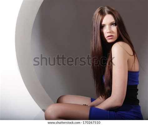 Sexy Brunette Blue Dress Sitting Circle Stock Photo 170267510 Shutterstock
