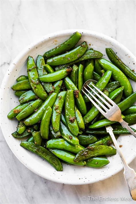 Garlic Butter Sugar Snap Peas Recipe (10-mins!) - The Endless Meal®
