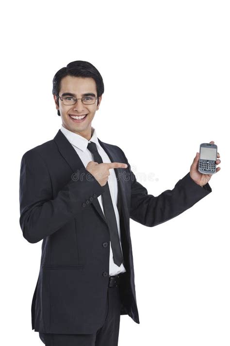 Businessman Holding A Mobile Phone And Smiling Stock Image Image Of