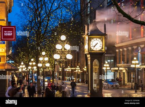 Gastown Steam Clock And Downtown Beautiful Street View On A Rainy Night