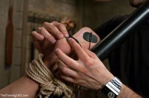 Stunning Brunette Is Shackled To A Wall Whi XXX Dessert Picture