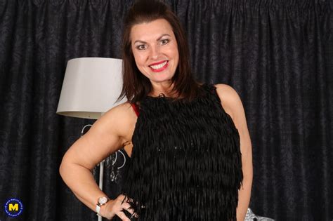 Age 40 Plus Beauties Busty Mature Woman In Black Pantyhose Red Lingerie Strips To Spread