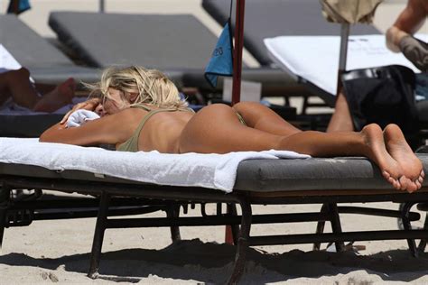 Italian Star Melissa Castagnoli Bikini Thong Areola Peek Photos Scandal Planet