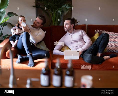 Gay Couple Baby Bottle Hi Res Stock Photography And Images Alamy