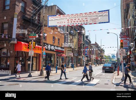 Chinatown Philadelphia View Of People Walking Along 10th Street In The