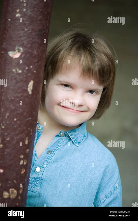 Girl With Downs Syndrome Smiling At Camera Portrait Stock Photo Alamy