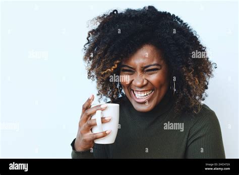 Closeup Smiling African American Black Woman With Curly Hair Holding A