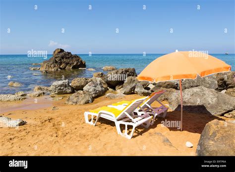 Beachbeds And Sunshade In San Blas Bay Gozo Malta Stock Photo Alamy