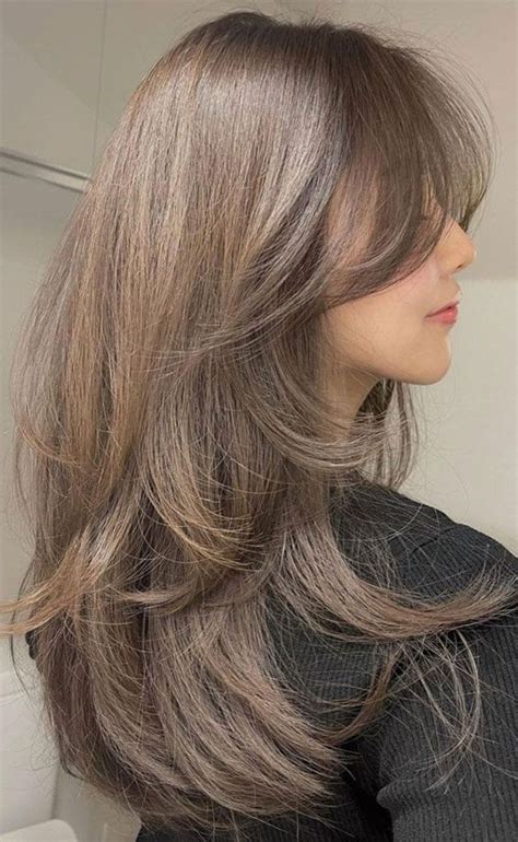 Flowing Elegance Long Layered Haircuts Ideas Classic Cascade