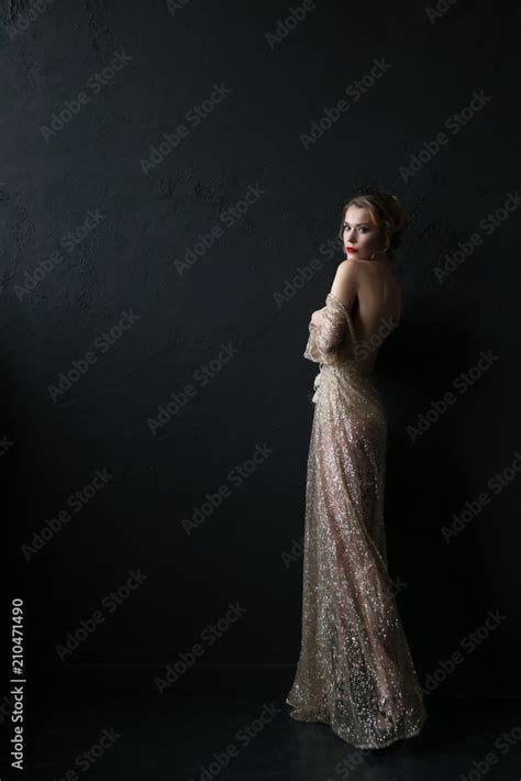 Sexy Blonde In Transparent Dress With Golden Rhinestones Stock Photo Adobe Stock