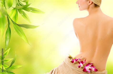 Beautiful Woman With Naked Back Over Green Abstract Background Stock Photo Adobe Stock