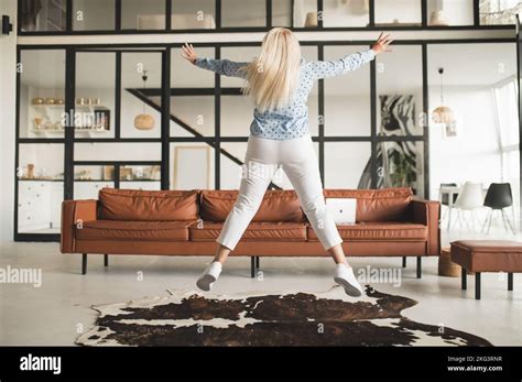 Blonde Woman Feeling Excited And Looking Energized Stock Photo Alamy
