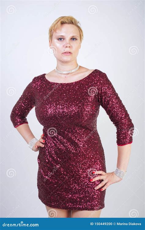 Cute Caucasian Curvy Girl With Short Blonde Hair And Plus Size Body Wearing Beautiful Elegant