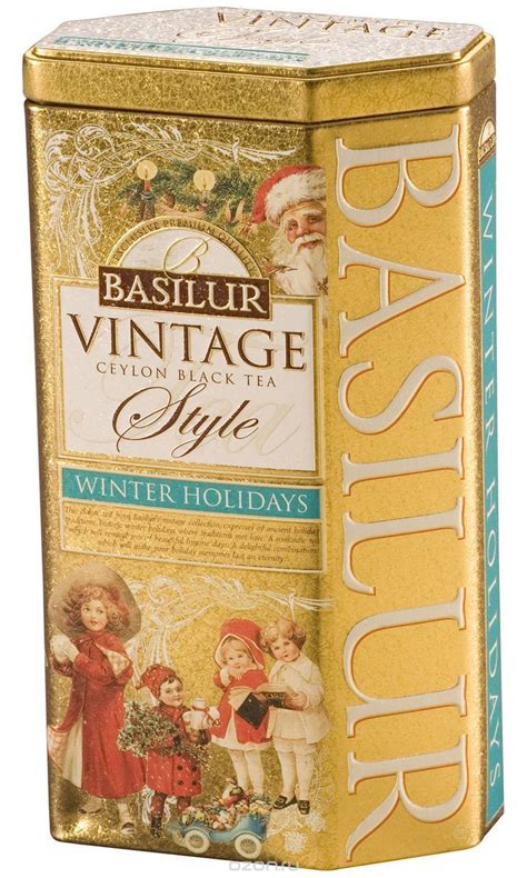 an old fashioned tin canister with christmas decorations on the front ...