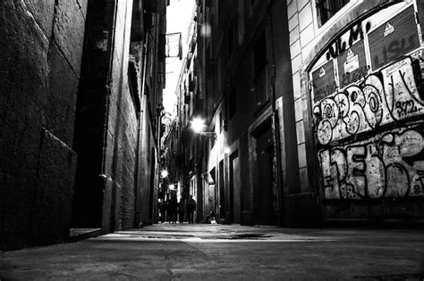 Premium Photo Alley Amidst Buildings In City