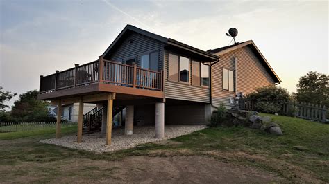 Dated Deck to All Season Sunroom – Time 2 Remodel®