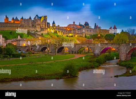 Night view over illuminated fortification of Carcassonne, France ...