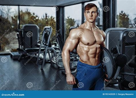 Muscular Man Posing In Gym Shaped Abdominal Strong Male Naked Torso Abs Working Out Stock