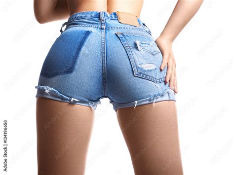 Sexy Woman In Fashion Blue Jeans Shorts Perfect Hot Booty And Erotic Curves Hips Stock Photo