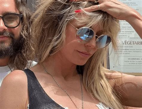 In A See Through Vest Heidi Klum Teases Fans With Her Lace Lingerie
