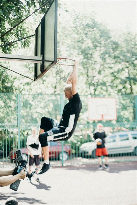 man dunking   basketball court  stock photo
