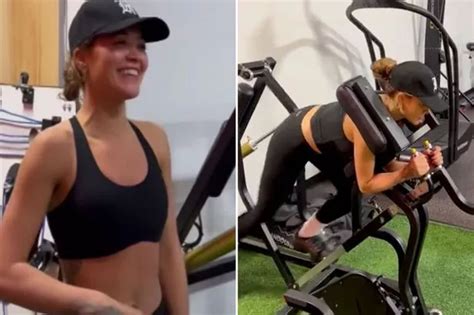 Rita Ora Showcases Washboard Abs As She Tugs Up Top In String Bikini