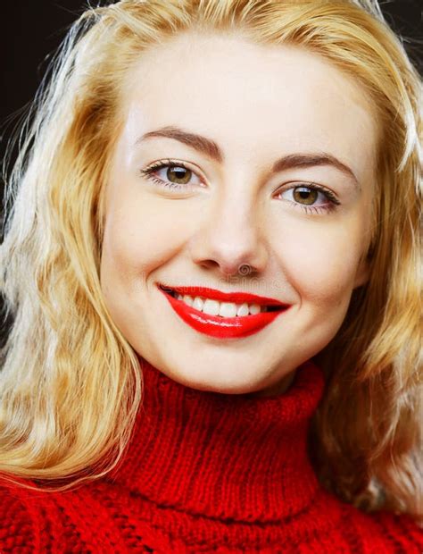 Smiling Blonde In Red Sweater Stock Image Image Of Cosmetics Female