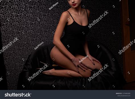 Sexy Brunette Black Body Posing Indoors Stock Photo