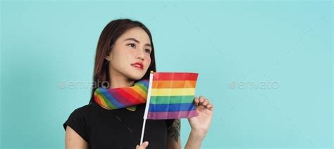 Lgbtq Girl And Pride Flag Sexy Lesbian Girl And Lgbt Flag Standing Blue Green Background