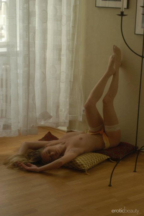 Slender Teen Lucie Shows Her Small Tits Poses Nude In A Solo