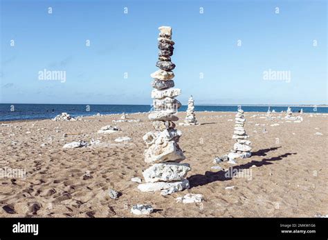 Cairns Of Flint Stones Standing On The Sandy Beach Of Klitmöller On The