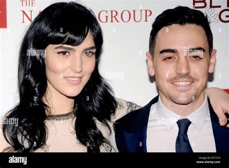 Michael Lohan Jr. and Ali Lohan attend the TNG Holiday Launch Stock