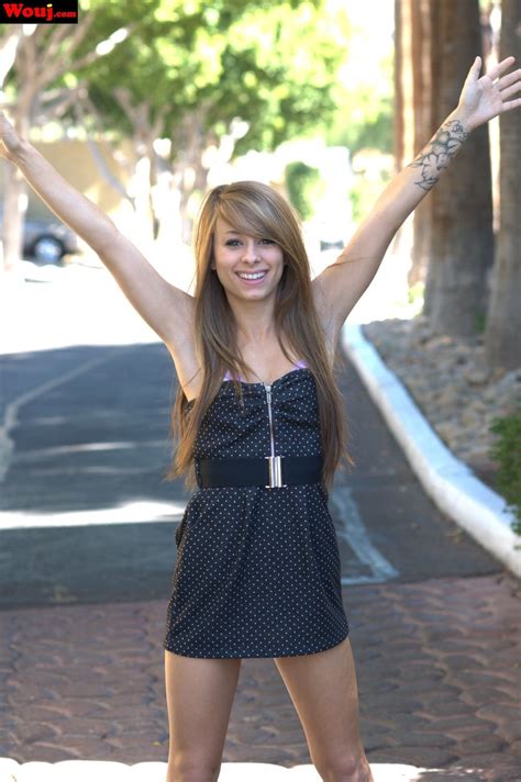 Hot Amateur Chick With Arm Tattoos Poses Outdoors For Her New Fans 15 Photos