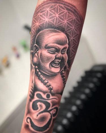 laughing buddha  om symbol forearm tattoo spiritual harmony