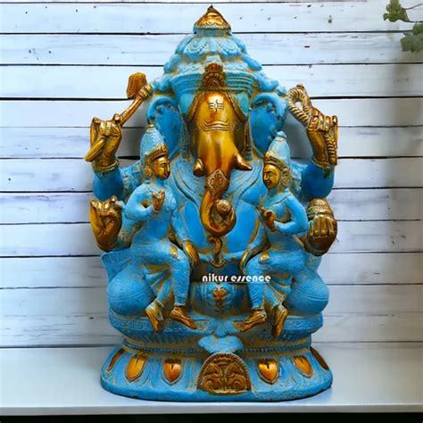 blue ganesha sitting  riddhi siddhi brass idol  inches brass