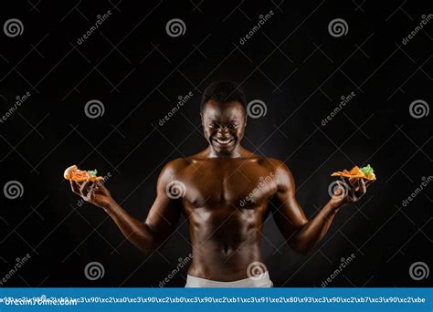 Black Handsome Naked Man With A Pizza Safety Food Delivery For People Who Stays At Home Stock