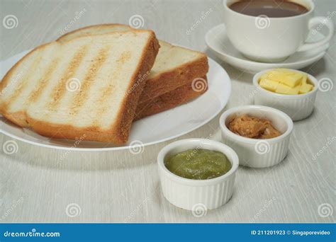 Morning Breakfast Toasted Bread Butter Kaya Peanut With Coffee Stock