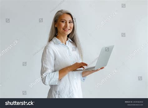 Attractive Mature Asian Business Lady Grey Stock Photo 2034362432 Shutterstock