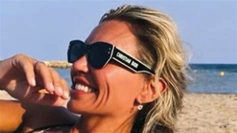 Christine McGuinness Sets Pulses Racing In A Skimpy Red String Bikini As She Soaks Up The